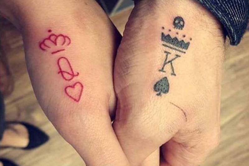 Finger tattoos of King and Queen card