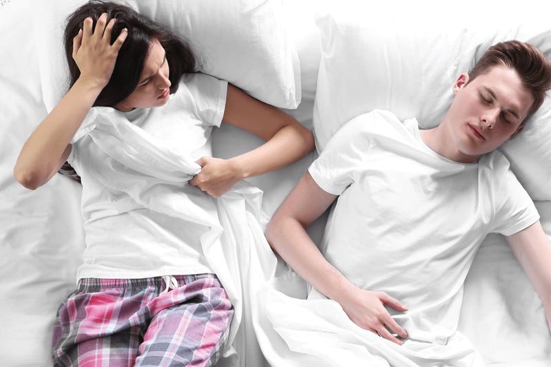 How to Sleep Better with a Restless Partner