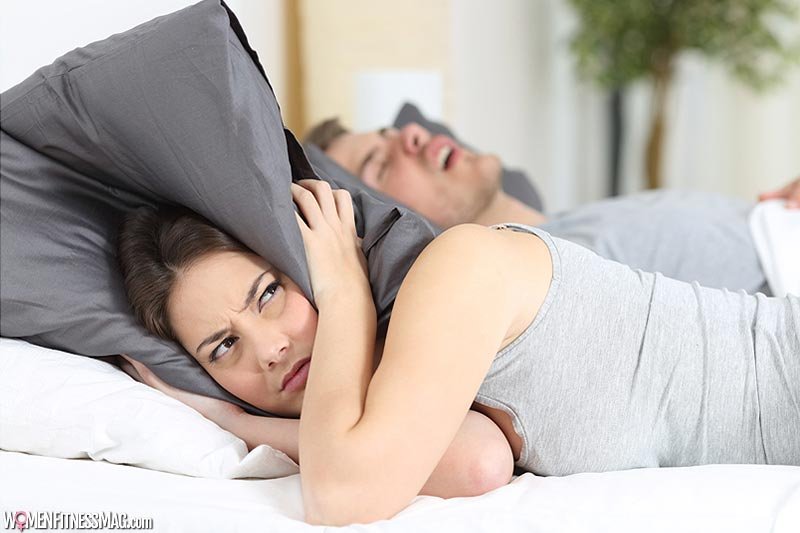How to Sleep With Someone Who Snores